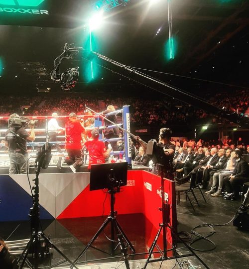 Boom op working at boxing match